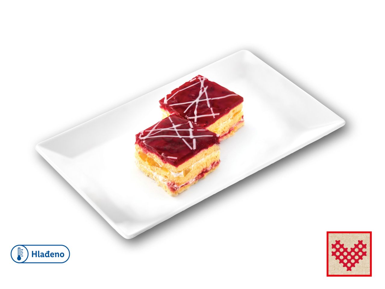 Dvije kocke kolača s crvenim preljevom na bijelom tanjuru.