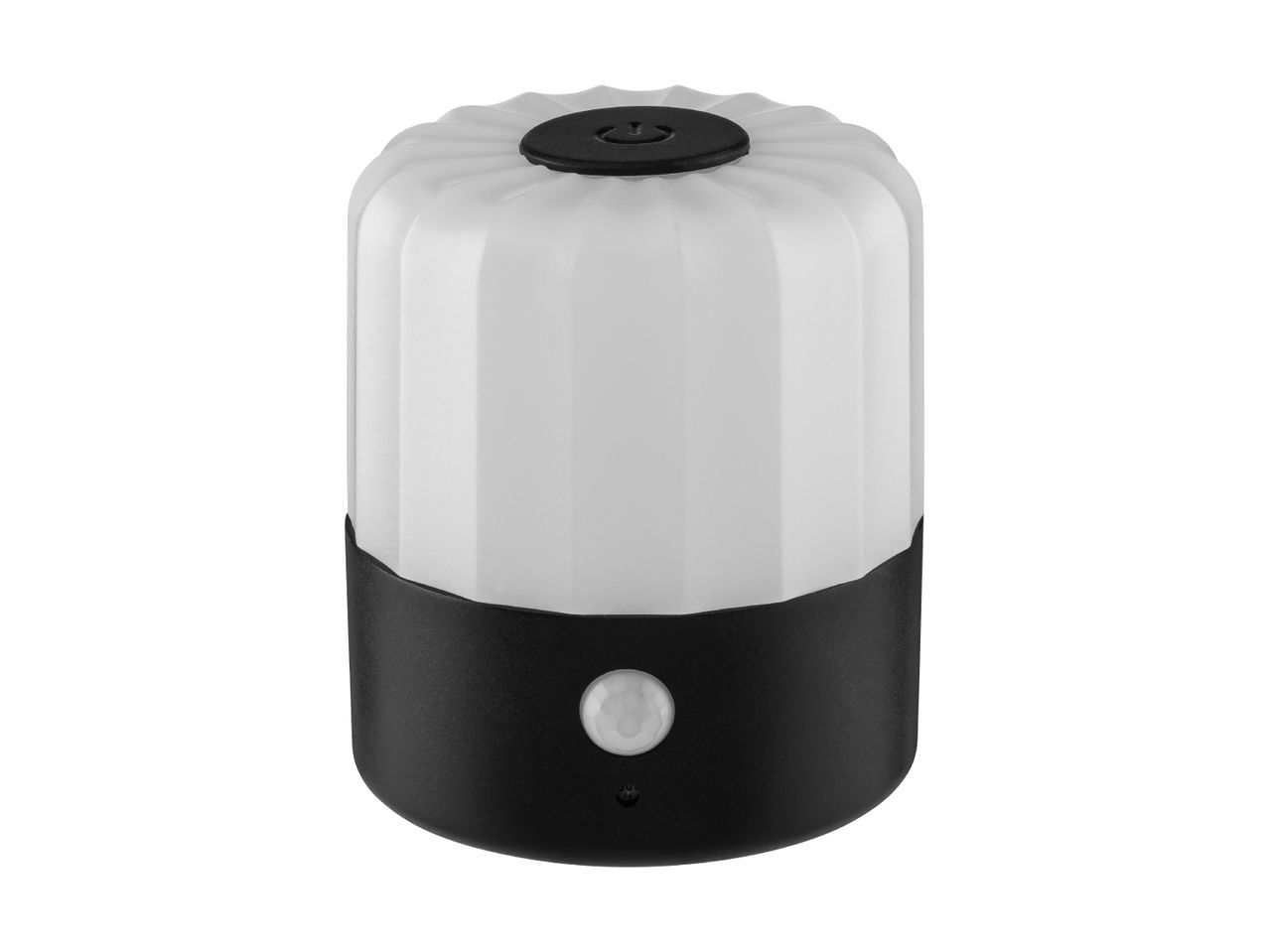 Hvid og sort LED-natlampe med bevægelsessensor og rillet top.