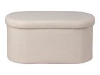 An off-white, oval-shaped ottoman with a textured, bouclé-like fabric.