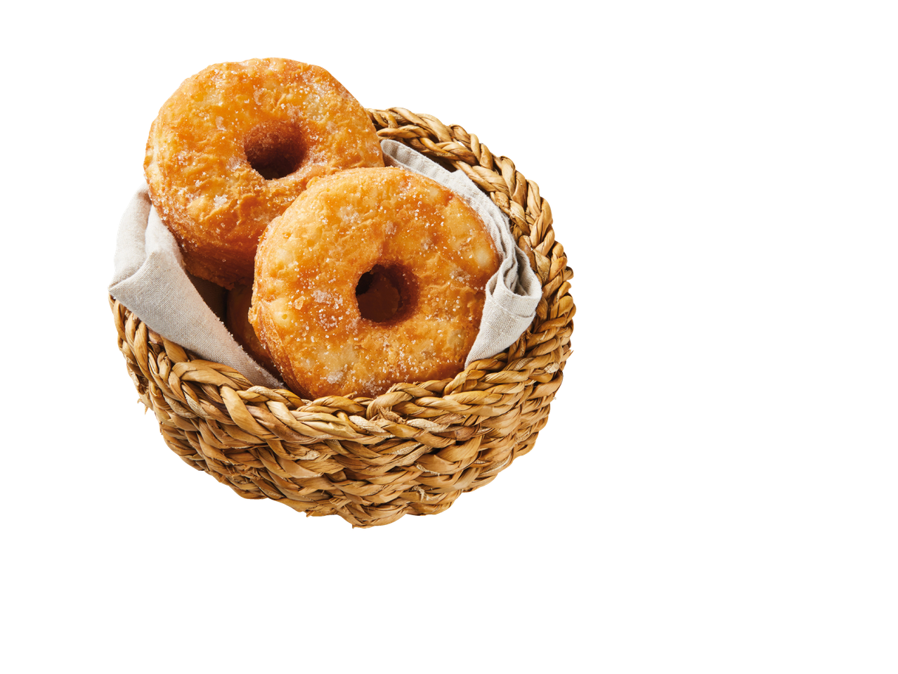 Divi cukura pūkaini donatsi grozā.