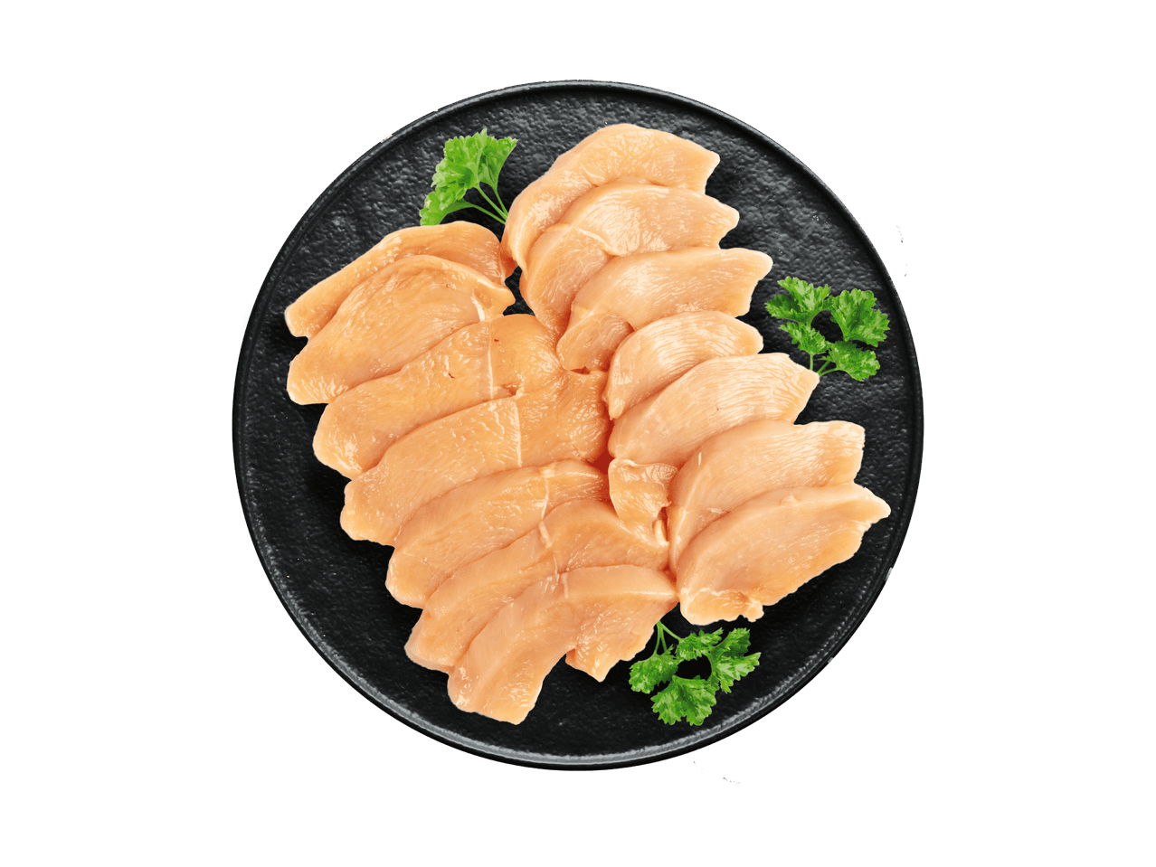 Rohe Hähnchenbrustfilets auf einem schwarzen Teller mit Petersilie garniert.