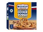 Ready-to-bake salted caramel cookie dough box with baked cookies and oven instructions.