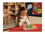 A girl playing with a colorful wooden abacus, learning numbers and basic math.