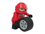 Toy race car driver in red suit and helmet, holding a tire.