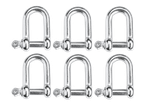 Six shiny metal D-shackles arranged in two rows.