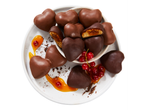 Favorina Chocolate Gingerbread Hearts with Apricot, garnished with redcurrants and sauce.