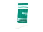 Green and white striped athletic sock with text on the side.