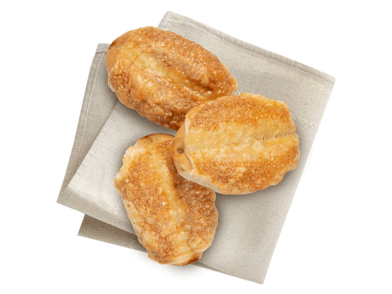 Käsebrötchen auf einem Leinen-Servietten.