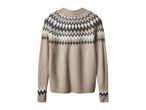 Women's beige knit sweater with a classic Fair Isle pattern around the collar and cuffs