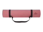 A rolled-up pink Crivit yoga mat with black carrying straps.