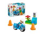 Toy police motorcycle set with a rider, traffic cones, and a traffic light, with its box.