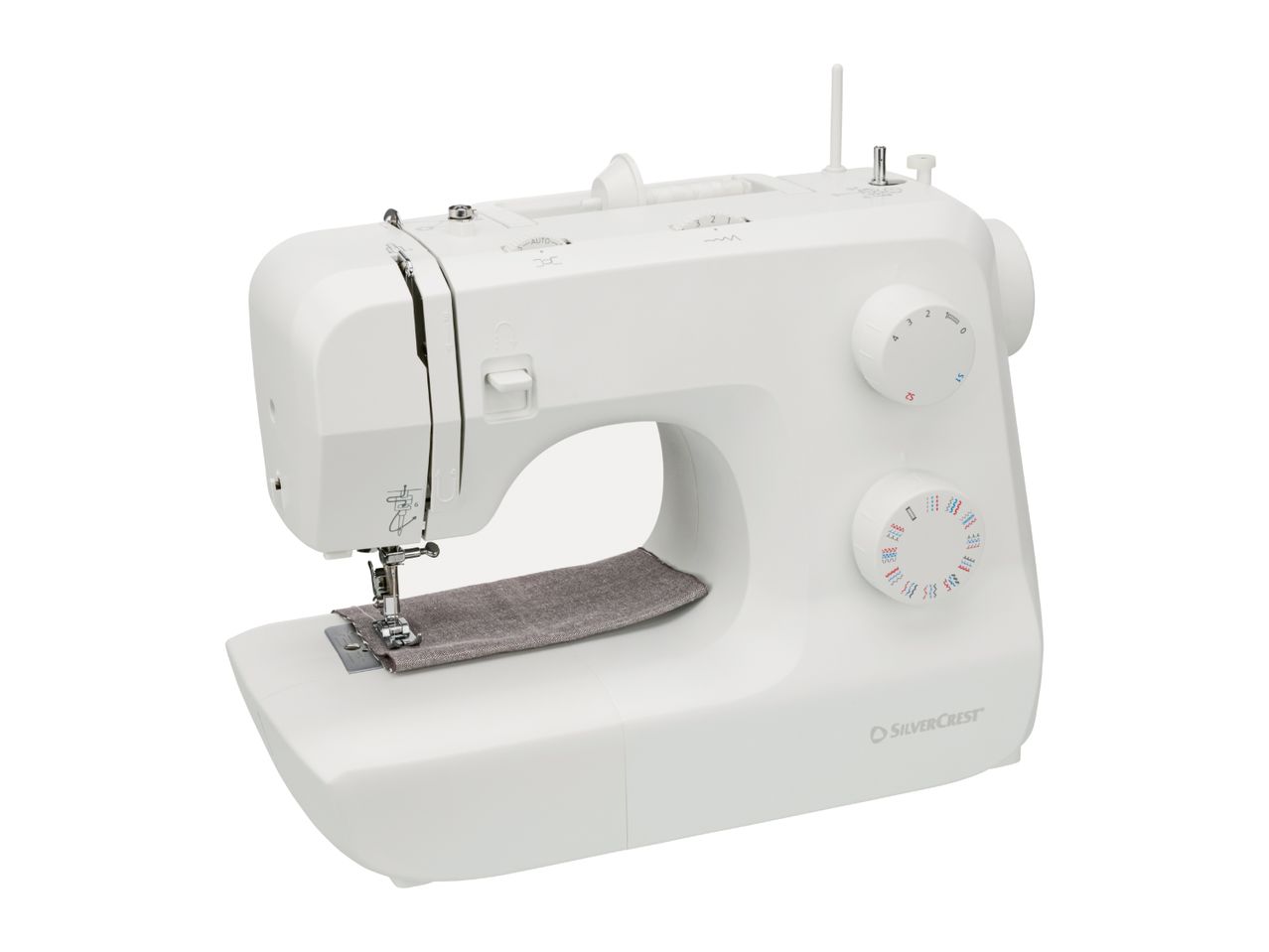 White sewing machine with a piece of grey fabric under the needle