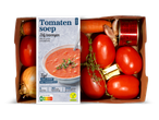 Verspakket voor tomatensoep met verse groenten en een blikje tomatenpuree