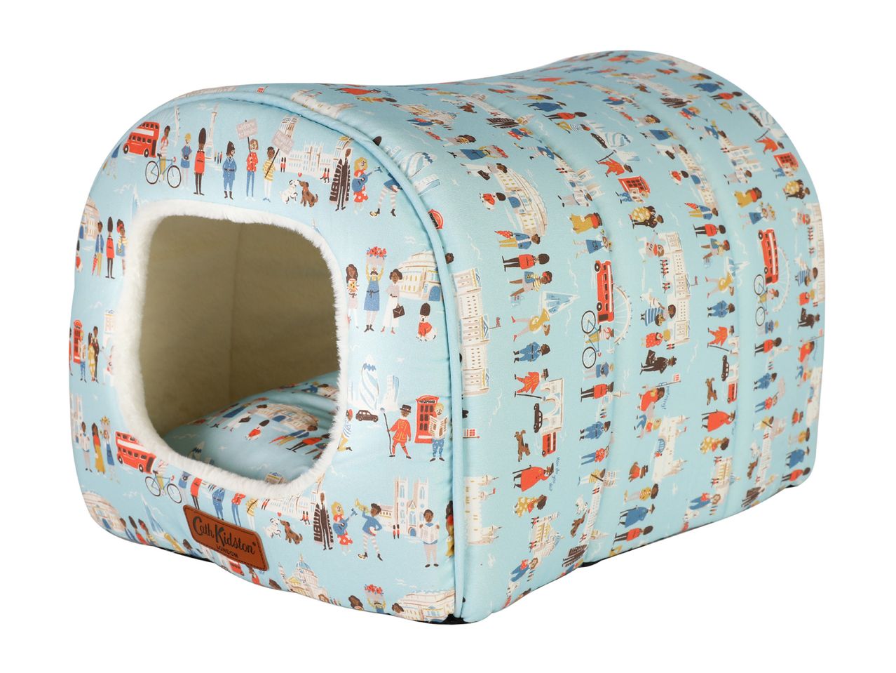 A Cath Kidston London-themed pet bed, light blue with illustrations of London landmarks and people.