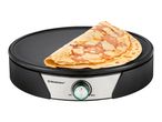 A black electric crepe maker with a golden-brown crepe folded in half on its surface.