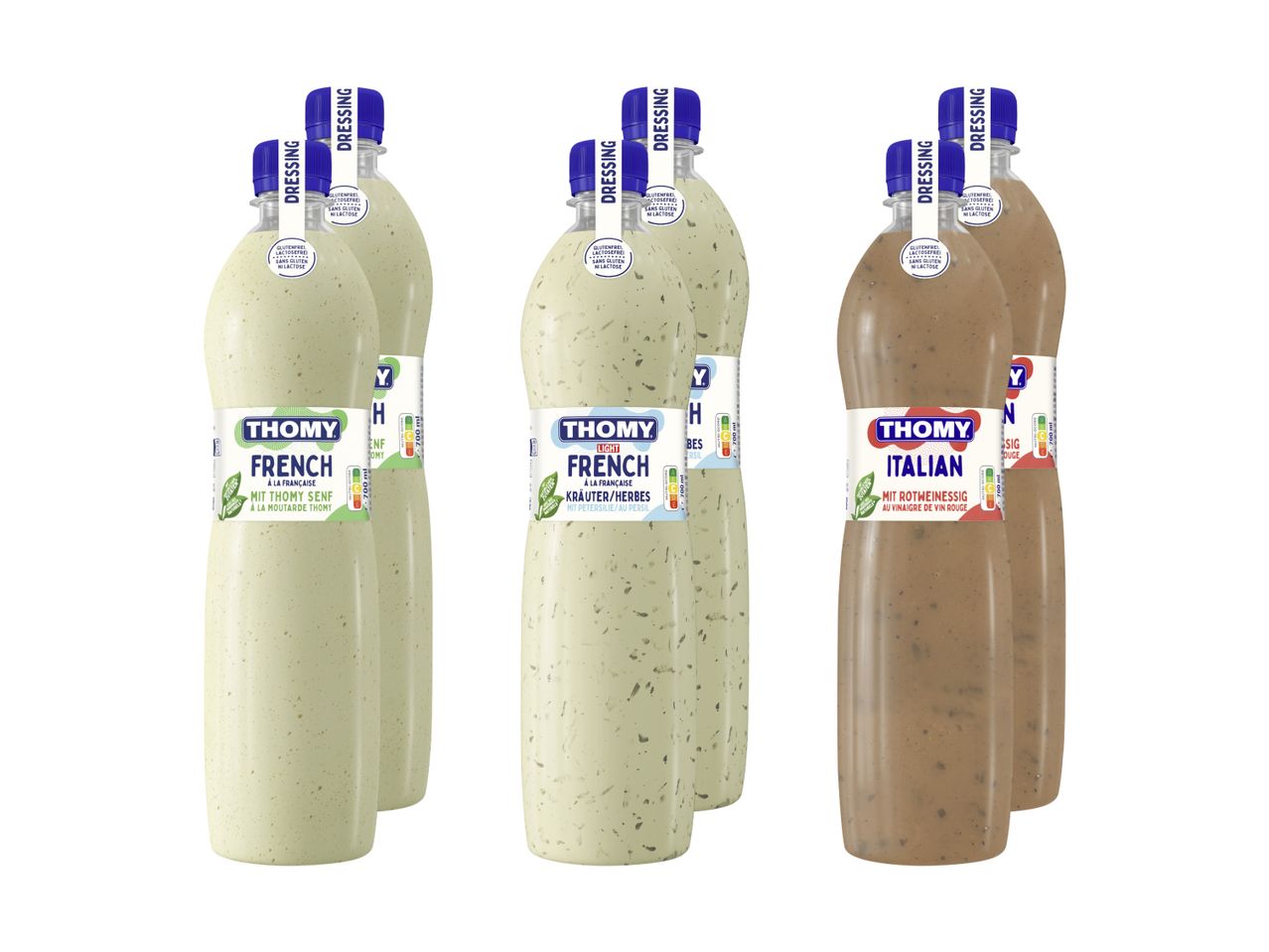 Drei Flaschen Thomy-Vinaigrette (französisch, französisch leicht, italienisch) stehen vor weißem Hintergrund.