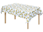 Lemon-patterned tablecloth on a wooden table.