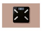 Black digital bathroom scale with a display showing '0.0 kg' and four silver footpads.