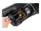 Hand turning the dial on a vacuum cleaner filter compartment to clean it