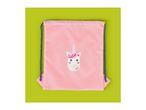 Pink drawstring bag with a unicorn face design on a green background.