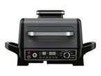 A black and grey multi-functional cooking appliance with a digital display showing temperature and time, and a dial for various cooking modes like roast, bake, air fry, and grill.