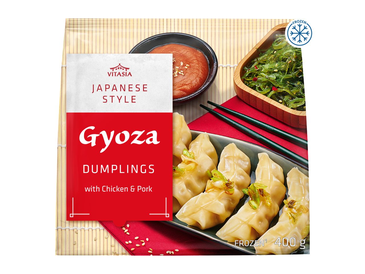 Japanese style Gyoza dumplings with chicken & pork, served with sauce and seaweed salad.