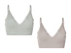 To bløde, lette bh-toppe i lysegrå og beige med blonder.