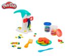 Play-Doh pasta maker with colorful dough, tools, and a plate of pretend spaghetti.