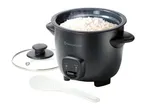 Black rice cooker with cooked rice, a glass lid, and a white serving spoon.