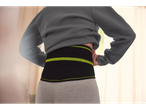 Woman wearing a sensiplast® Rückenbandage back support