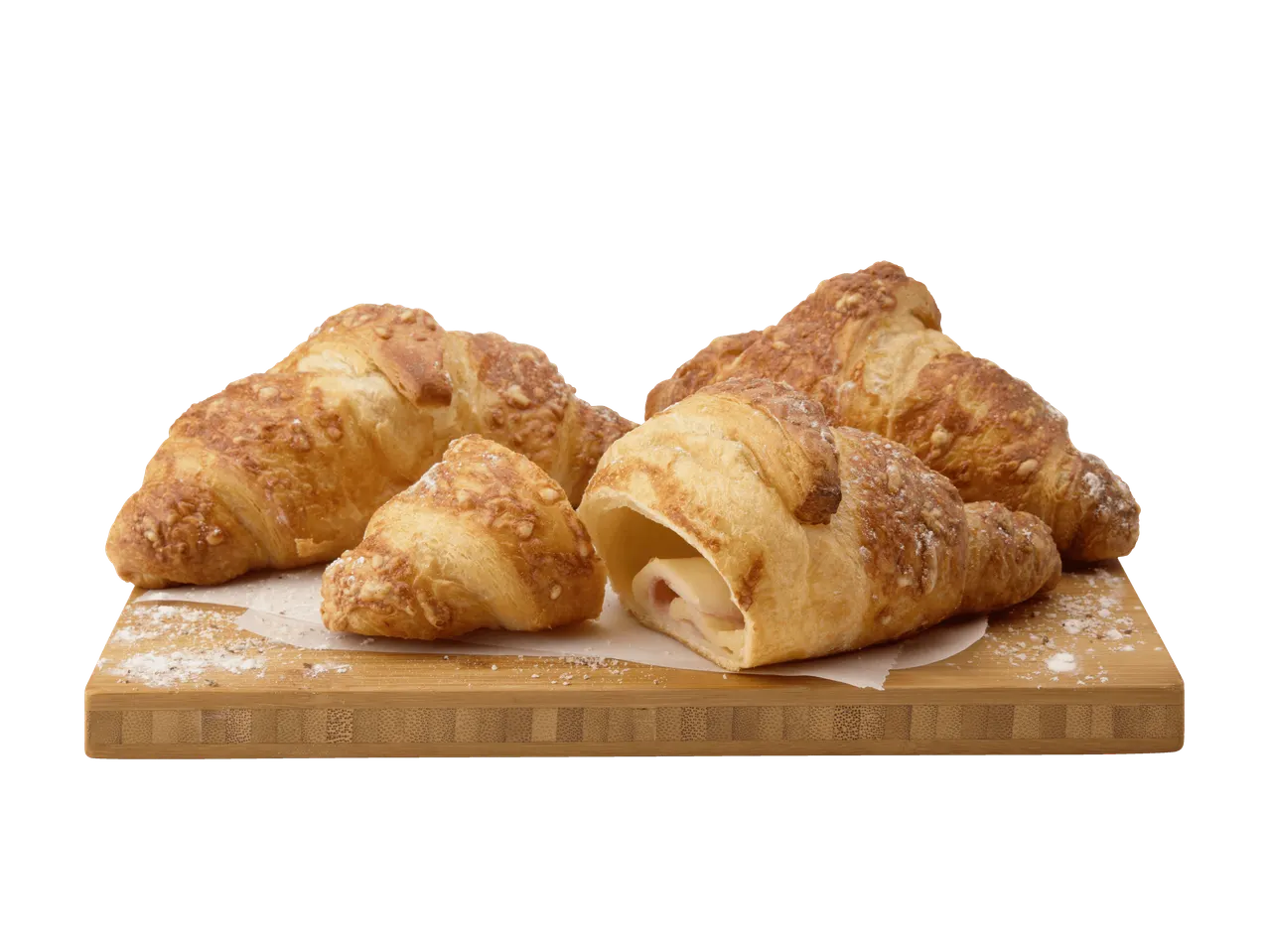 Tre croissant dorati al formaggio su un tovagliolo bianco