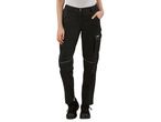 Person wearing black work trousers with knee pads and side pockets.