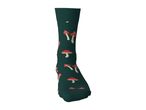 Dark green sock with a red and white mushroom pattern