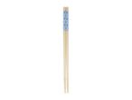 A pair of light-colored wooden chopsticks with a blue decorative band near the top.