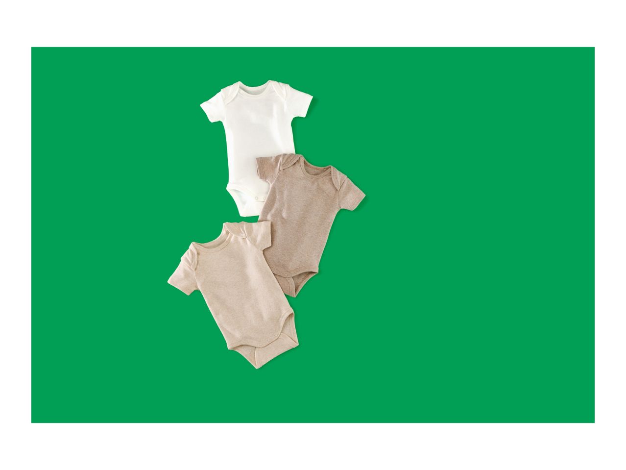 Three baby bodysuits in white, light brown, and beige on a green background.