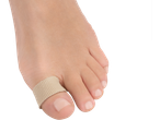Foot with beige toe separator.