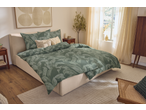 Livarno Home sateen duvet cover set with a green leaf pattern on a bed in a bright bedroom.