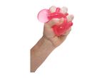 A hand squeezes a pink stress ball.