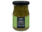 Een pot Deluxe Pesto met pistachenoten en basilicum.