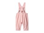 Pink baby overalls with criss-cross straps