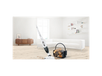 A Bosch vacuum cleaner stands on a light wood floor in a modern living room.