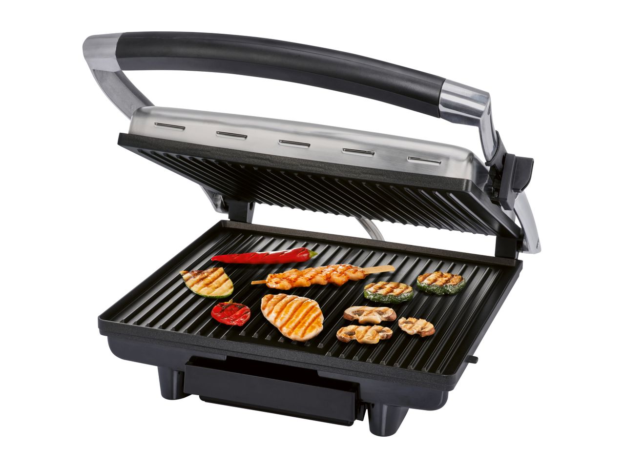 A black and silver contact grill cooking various foods.