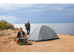 CRIVIT Camping Tent set up by the sea, with two people camping and preparing food.