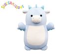 Light blue dragon plush toy with a white belly and colorful 'SQUISHMALLOWS' text above.