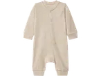 lupilu® Baby Sleepsuit in a light beige color with snap buttons down the front.