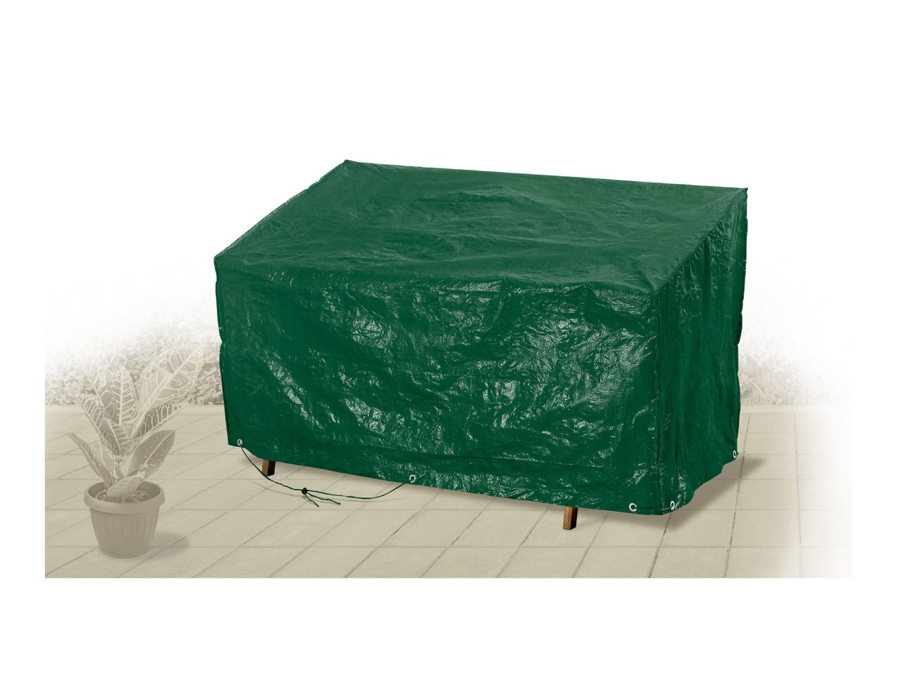 Green protective cover for garden furniture on a patio with a potted plant.