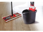 Vileda Ultramax mop and bucket set on a wooden floor.