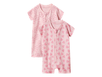 Dva ružičasta dječja kombinezona s kratkim rukavima, jedan s uzorkom cvijeća, drugi sa srcima.