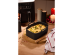 SILVERCREST® Air Fryer with a silicon insert holding a gratin, surrounded by festive decor.