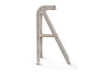 Light beige wooden learning tower with a natural wood step, viewed from the side.